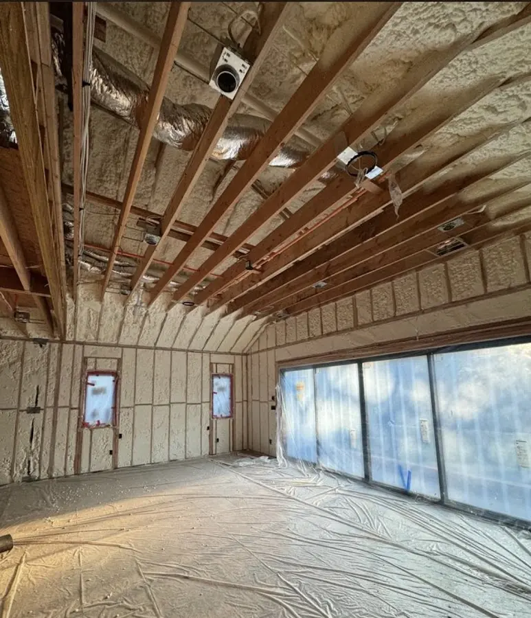 Interior walls and ceiling insulated with spray foam during new construction in Vinton
